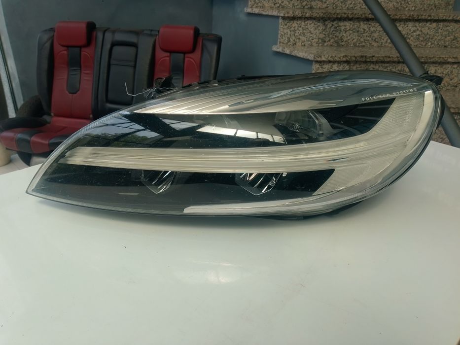 Farol esquerdo Volvo V40 / 31677022