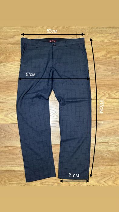 Брюки класичні в клітинку синього коліру