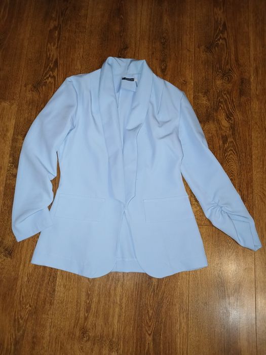 Жіночий блакитний піджачок