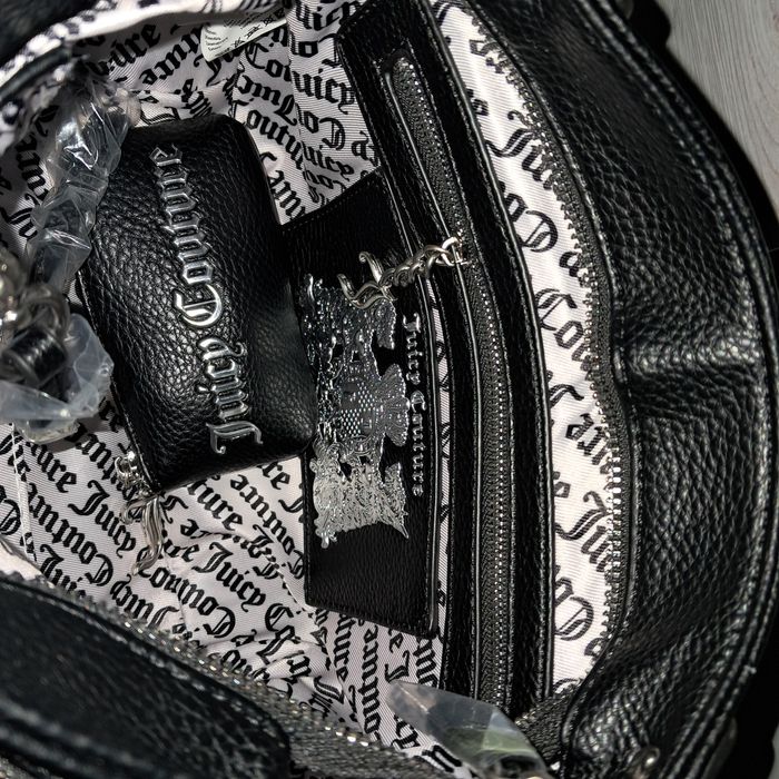 Torebka Juicy Couture  czarna
Nowa z metkami.
Rączki, pasek z re