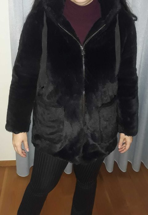 Casaco de pêlo preto