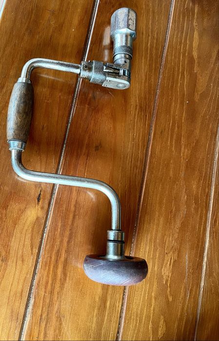 Antigo maquina de furar manual