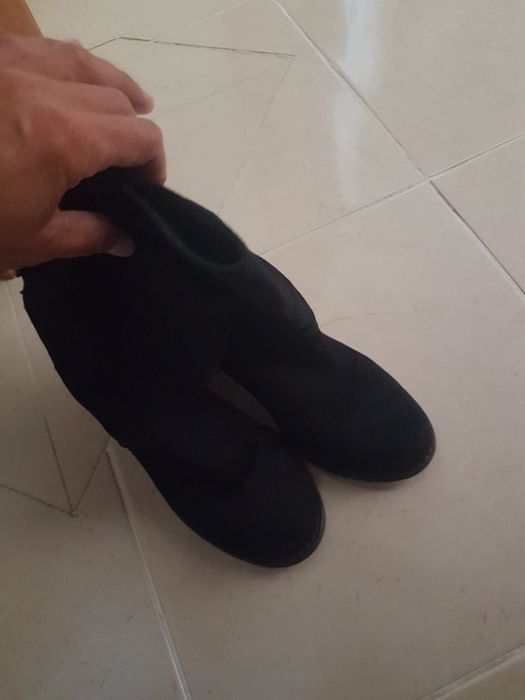 Botas pretas com capas novas