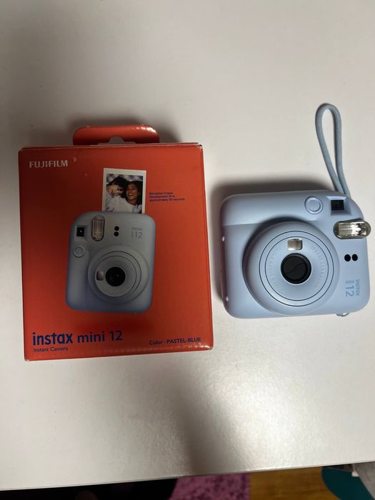 Instax mini 12 голубий +картриджі 10 штук новий
