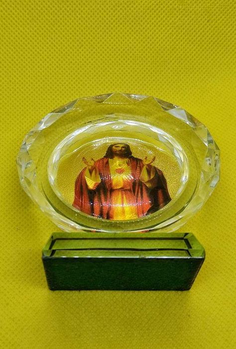 Imagem religiosa formato circular com base de Jesus Cristo