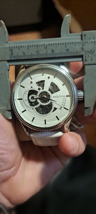 Relógio automático exactime.
