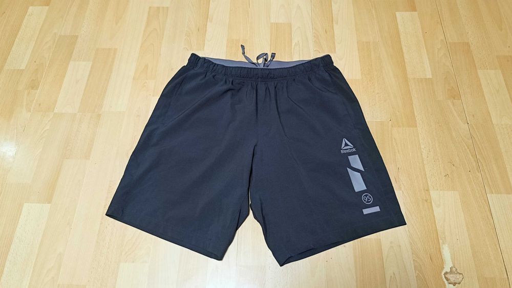 Męskie krótkie spodnie sportowe REEBOK r.L stan idealny