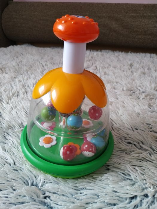 Продам детскую игрушку юлу Chicco