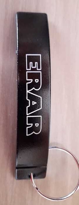 Saca caricas/porta chaves