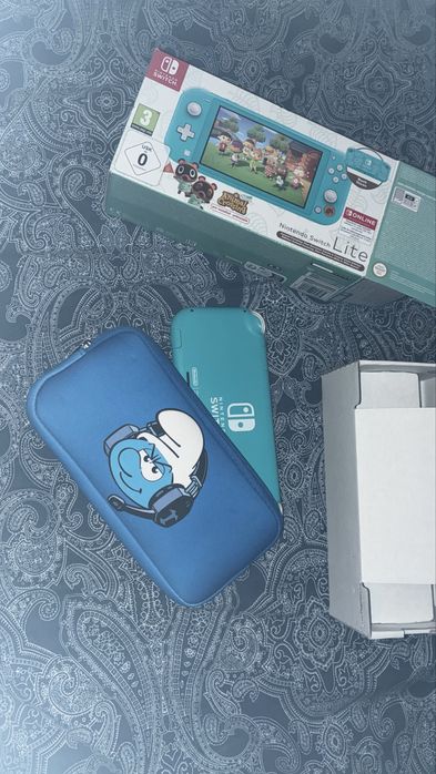 Consola Nintendo Switch lite turquesa com mala