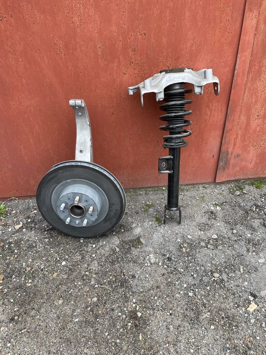 Tesla Y ступица поворотный кулак