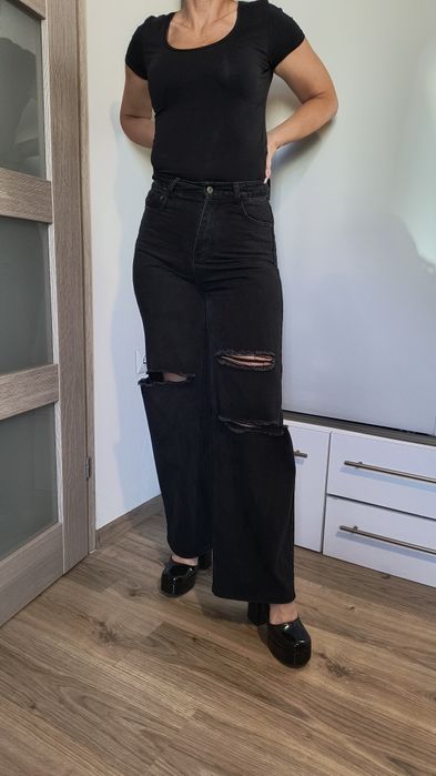 Spodnie dżinsy szerokie z rozdarciami