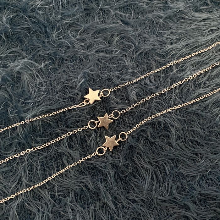 Conjunto de 3 pulseiras em prateado com Estrela (novas)