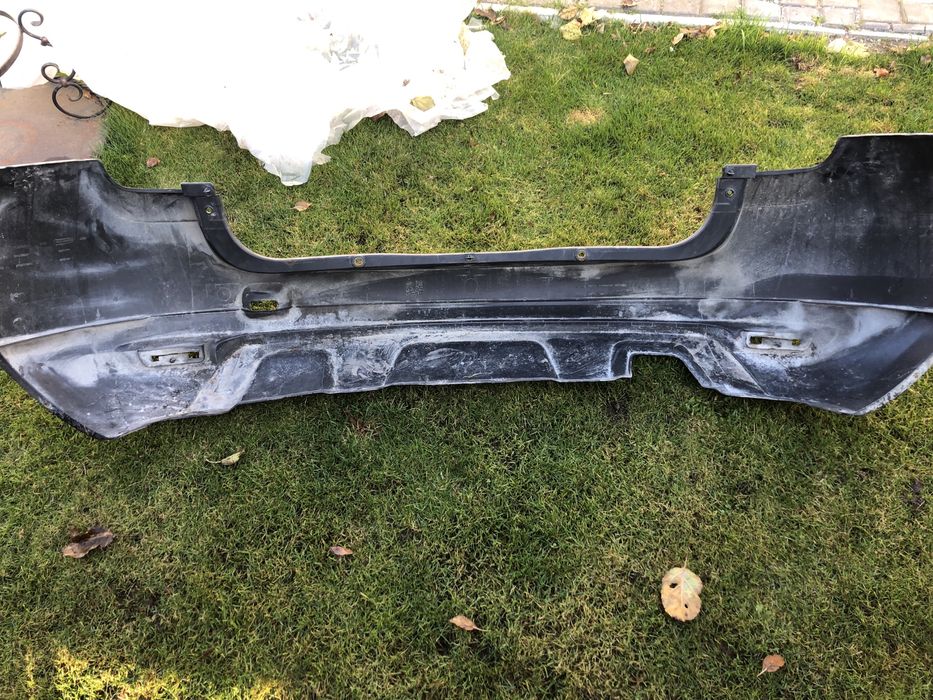 Задній бампер Renault Duster. Дастер