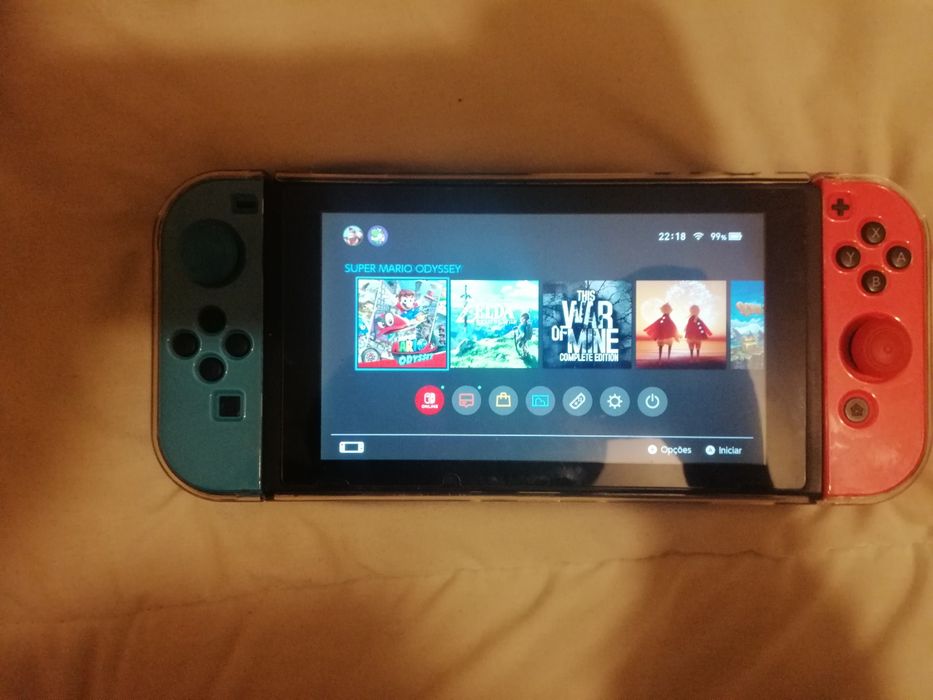 Nintendo Switch with Two Games, Charger, and Carrying Case64738628946051121