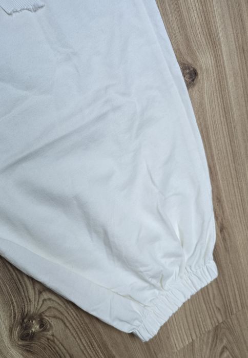 nowe dresowe spodnie włoskie w kolorze śmietanki