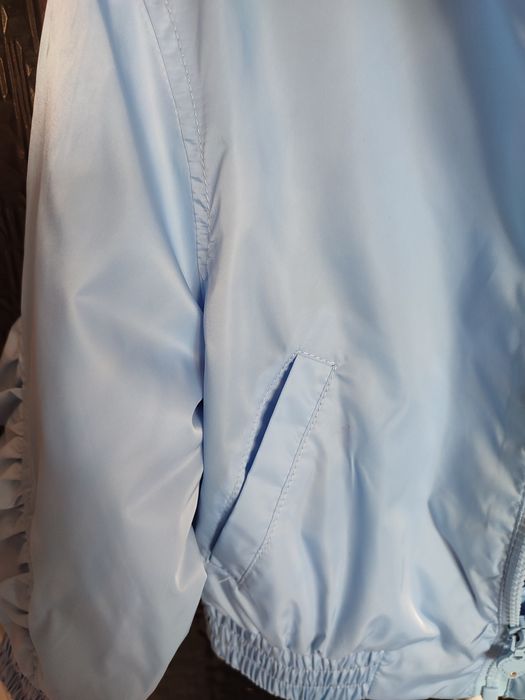 Блакитна куртка вітрівка на дівчинку 4/5 років