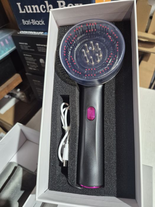 Масажер - гребінець для волосся .