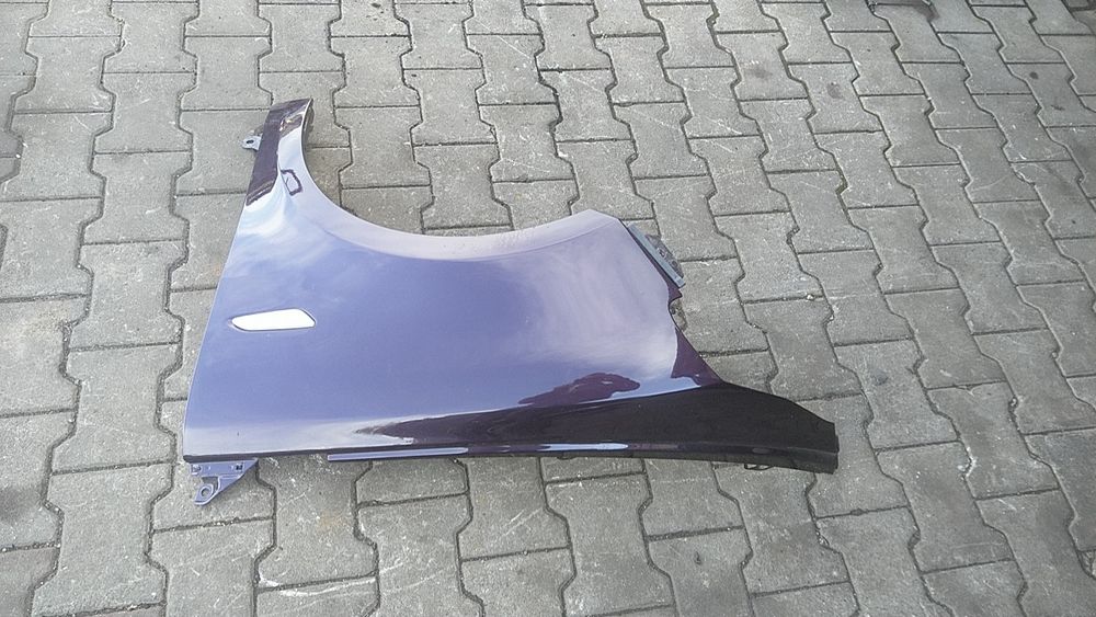 ) Lancia Ypsilon błotnik przedni lewy