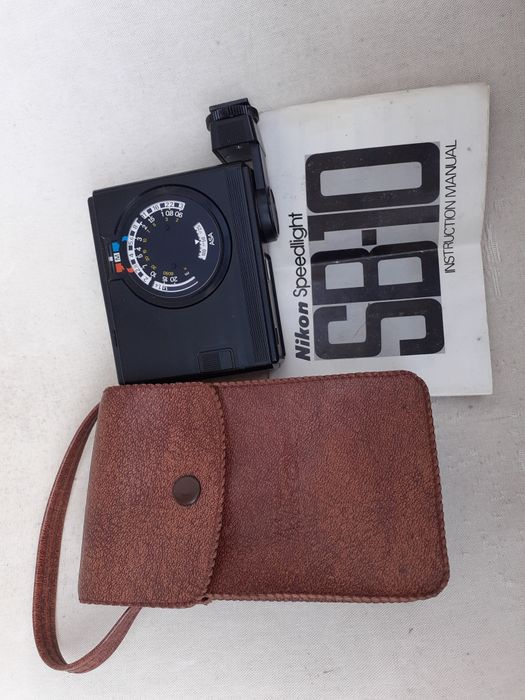 Flash NIKON antigo a funcionar e impecável conforme fotos.