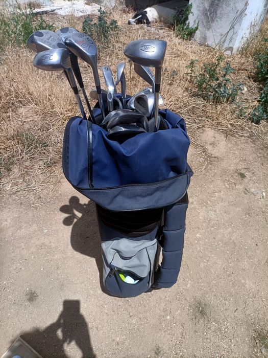 Saco de golfe e tacos esquerdo