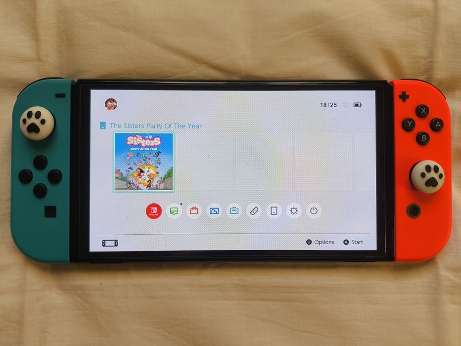 Nintendo Switch OLED + Extras