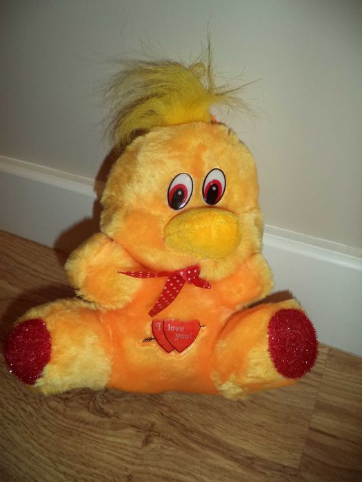 Peluche pato amarelo e vermelho