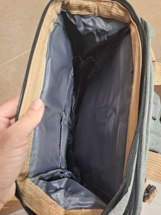 Mochila para bebé com parte de trás para trocar fralda