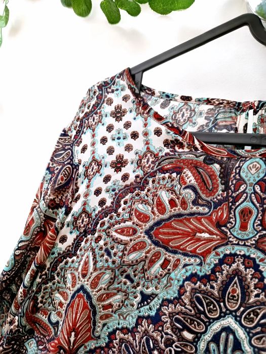 Blusa Fina com Cornucópias