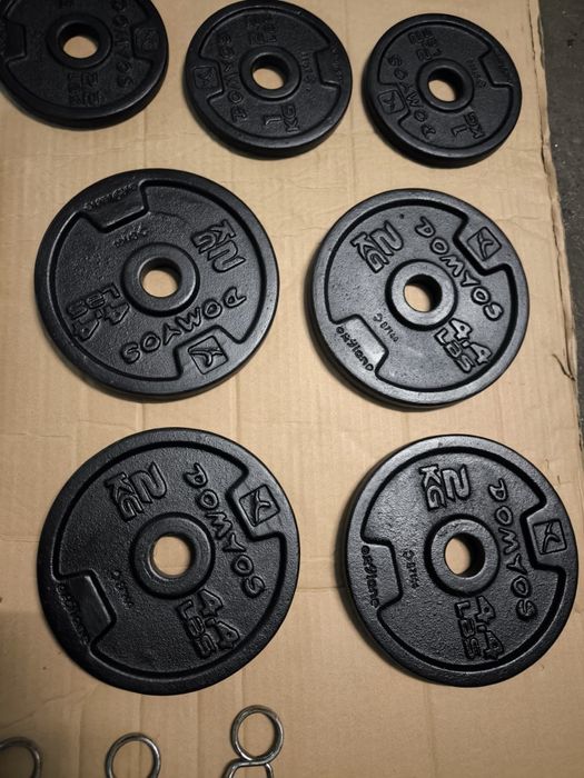 2 halteres com 12 anilhas como novos