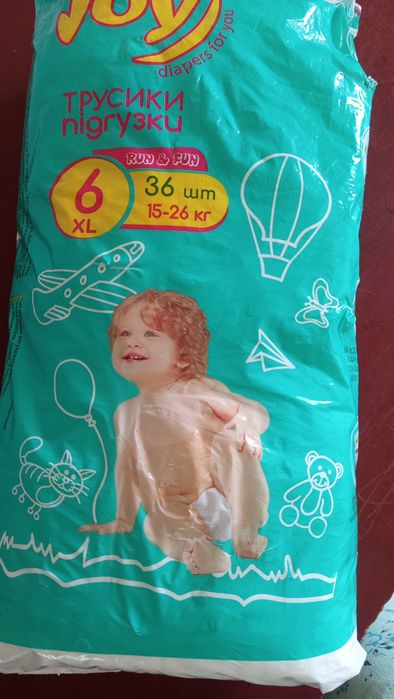 Продам памперсы joy 15 штук шестёрка трусики.  14 штук на липучках пятёрка.
