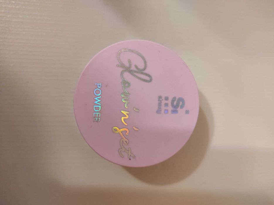 Puder rozświetlający sypki do twarzy sinsay