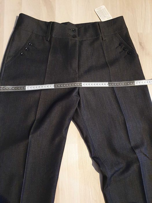 Spodnie damskie nowe 44