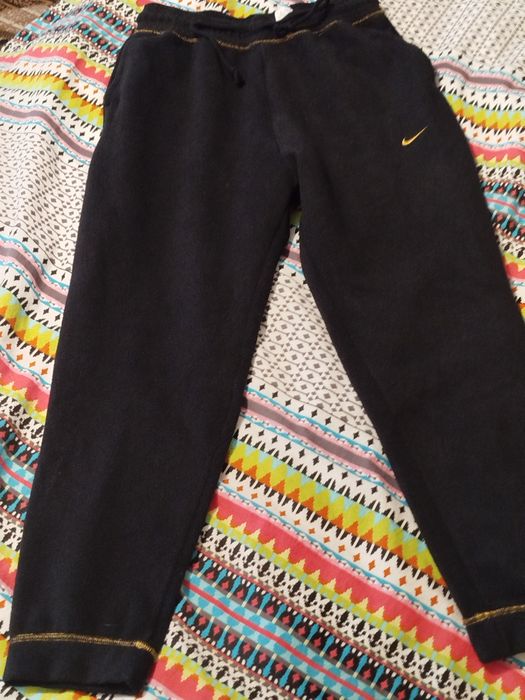 Czarne polarowe spodnie dresowe Nike M 38