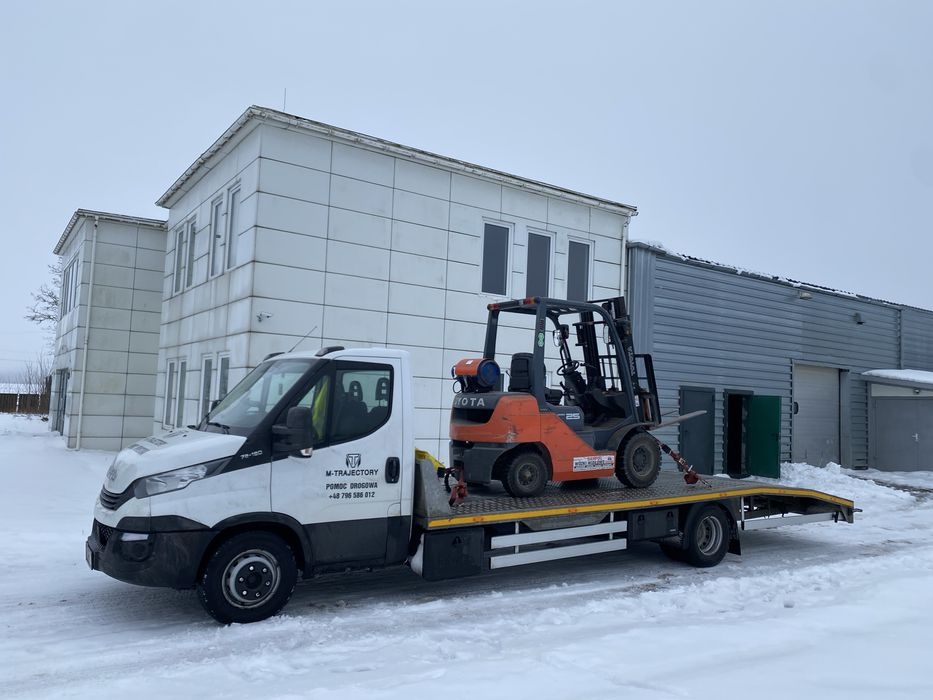 Transport maszyn samochodów osobowych Busów Usługi transportowe Laweta