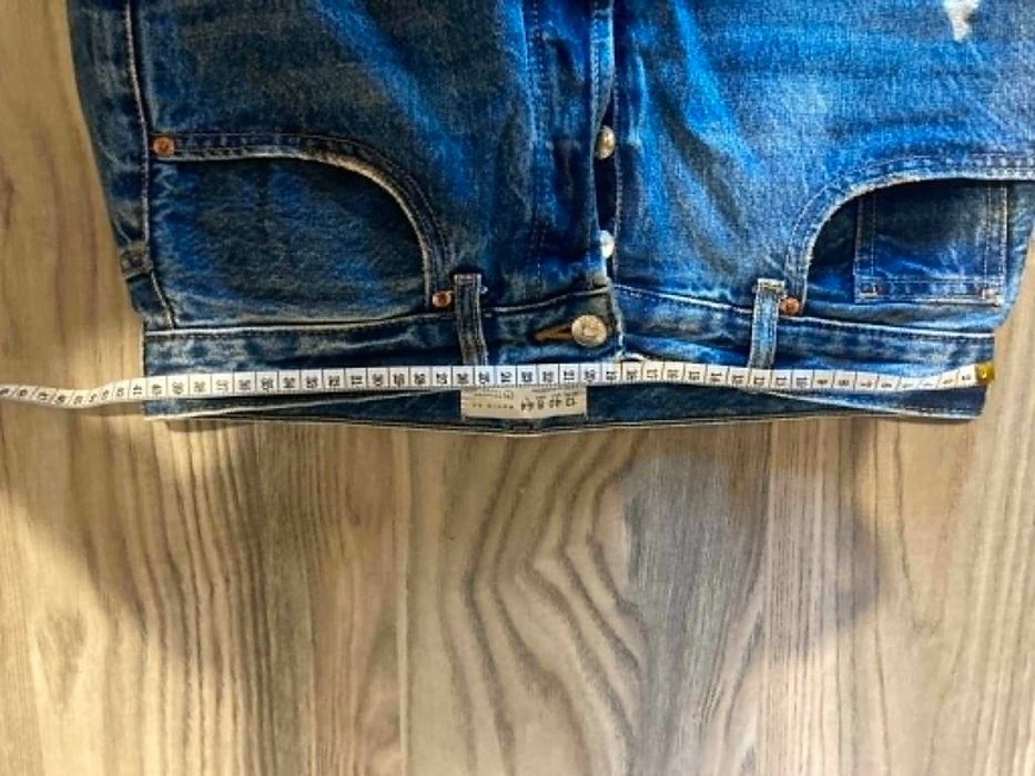 Jeansy wide leg z dziurami 40