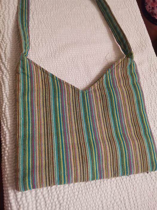 Bolsa tira colo verde de mulher