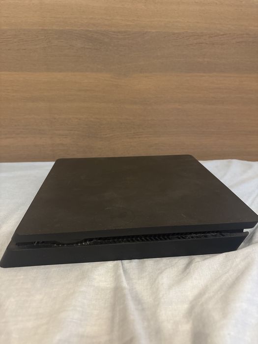 PS4 Slim 1 Tb + jogos