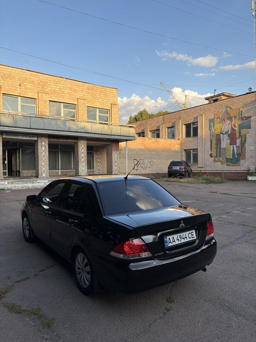 Mitsubishi lancer 9 1.6 газ автомат