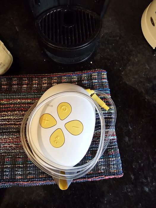 Bomba de tirar leite e camara de quarto