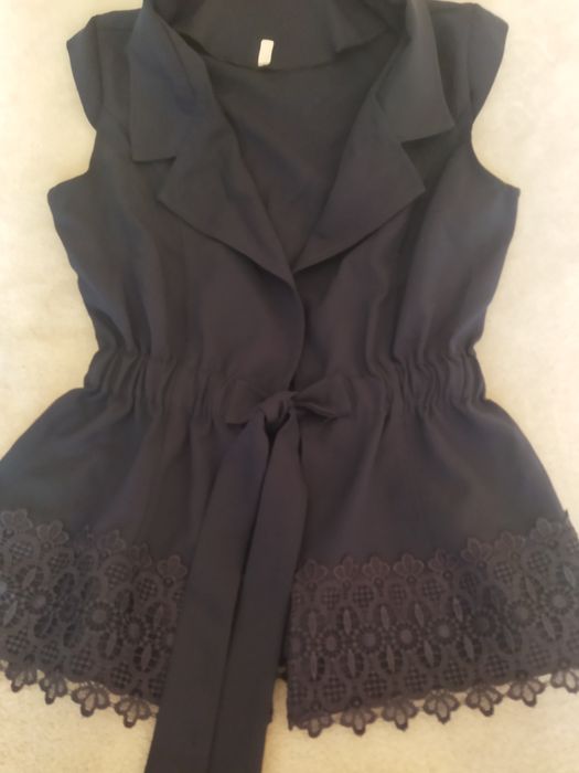 Шкільна желетка ,піджак.