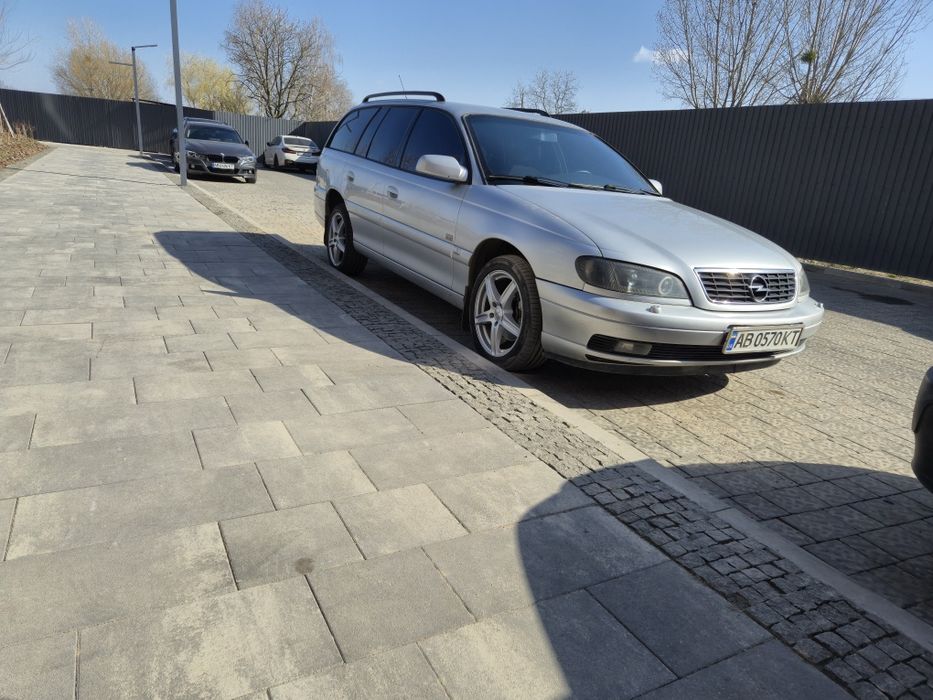 Opel Omega B.    —    2,5TD   M57.    
Про