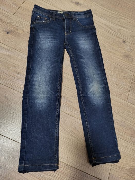 Jeansy ocieplane rozm 122