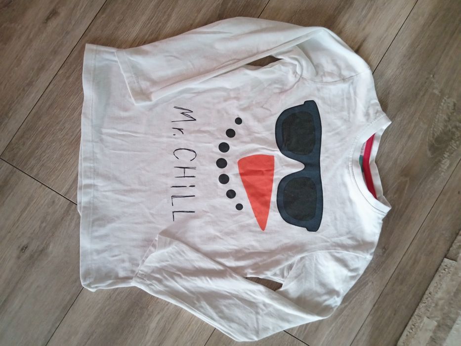 Biała bluzka na długi rękaw rozmiar 122cm.