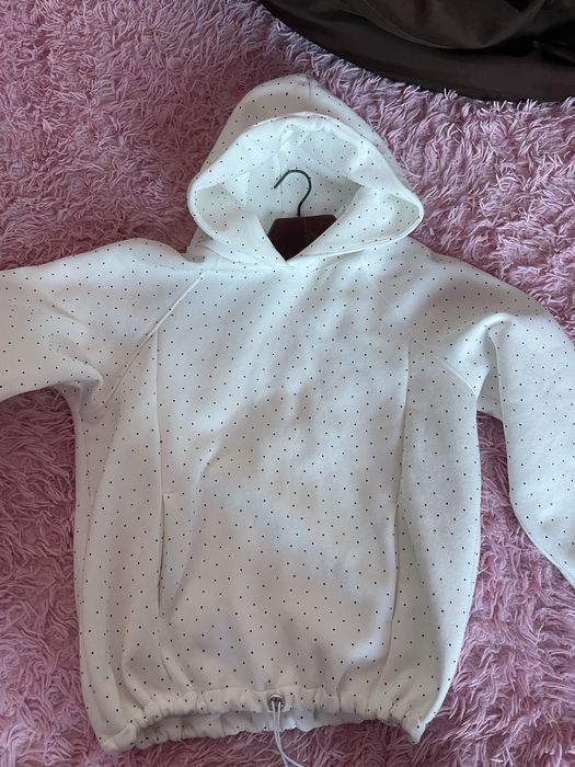 Жіноча біла кофта з блистківками