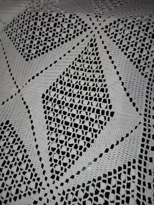 Colchas de renda e toalhas de renda