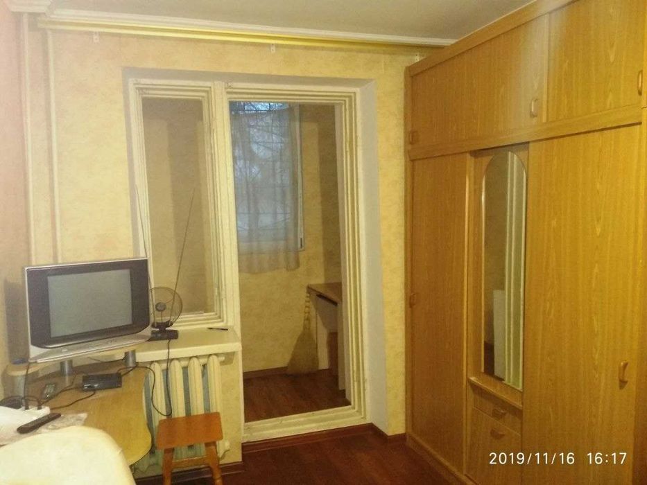 Комната с застеклённой лоджией в кирпичном доме