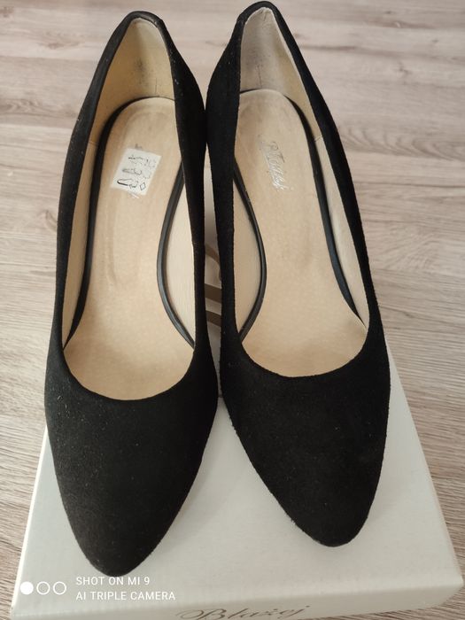 Buty na słupku Błażej