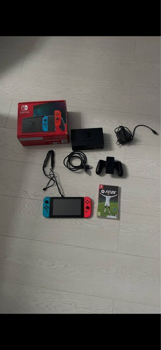Портативна ігрова приставка Nintendo Switch with Neon Blue and Neon Red Joy-Con (045496452629)