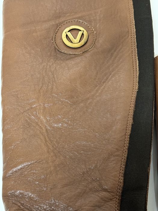 Bota castanha cano alto